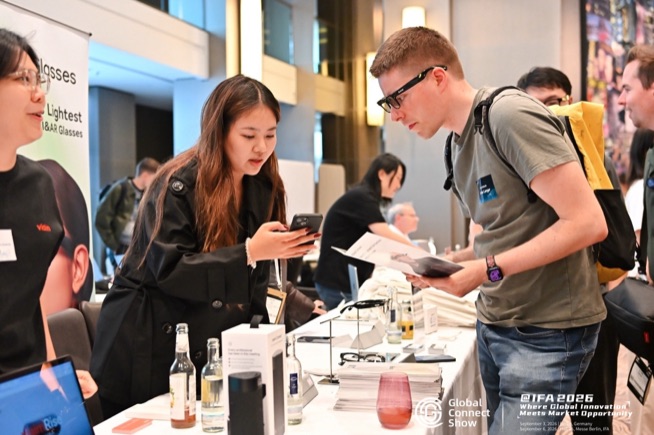 Attendees check out a product at a brand table, GCS @IFA 2026